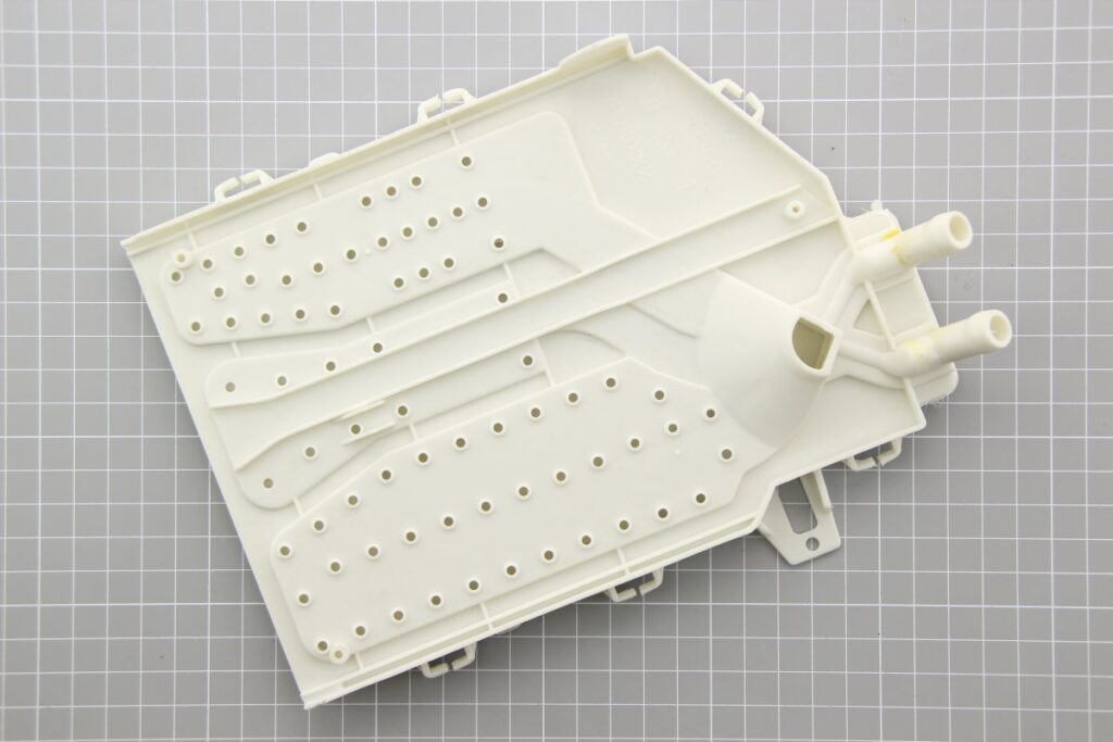 Skalbimo mašinos CANDY/HOOVER viršutinė stalčiuko dalis,orig. Skalbimo mašinų antivibraciniai padai įmontavimo rėmai ir kitos dalys